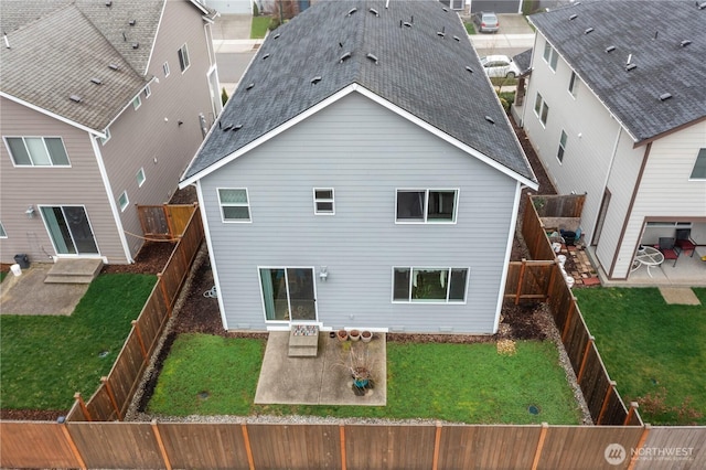 26334 203rd Pl SE, Covington, WA 98042 - rear view of property with a patio, roof with shingles, and a fenced backyard