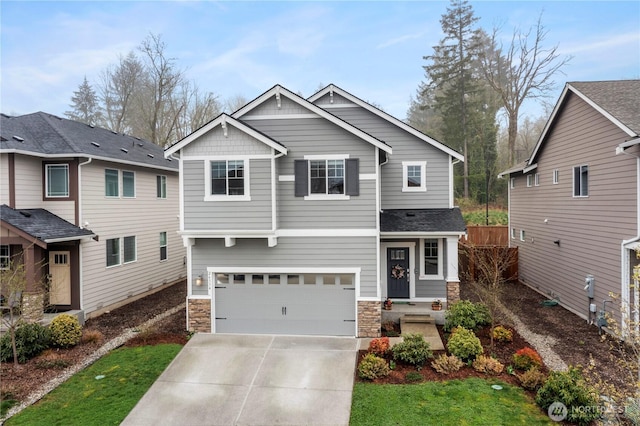 26334 203rd Pl SE, Covington, WA 98042 - craftsman inspired home with stone siding, driveway, and an attached garage