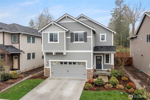 26334 203rd Pl SE, Covington, WA 98042 - craftsman-style house with stone siding, concrete driveway, and an attached garage