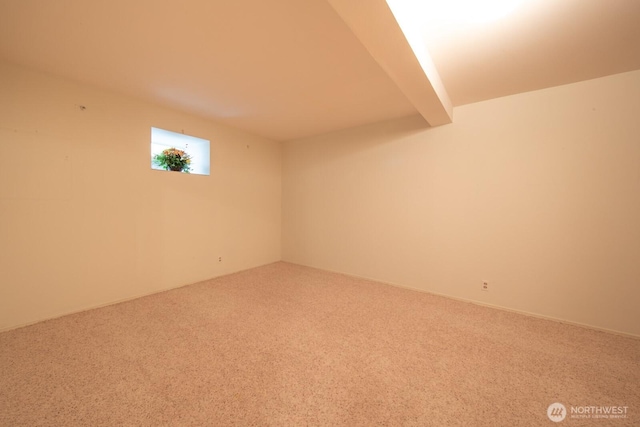below grade area featuring carpet floors