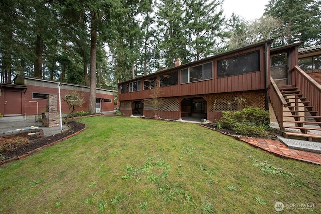 exterior space featuring stairway and a sunroom