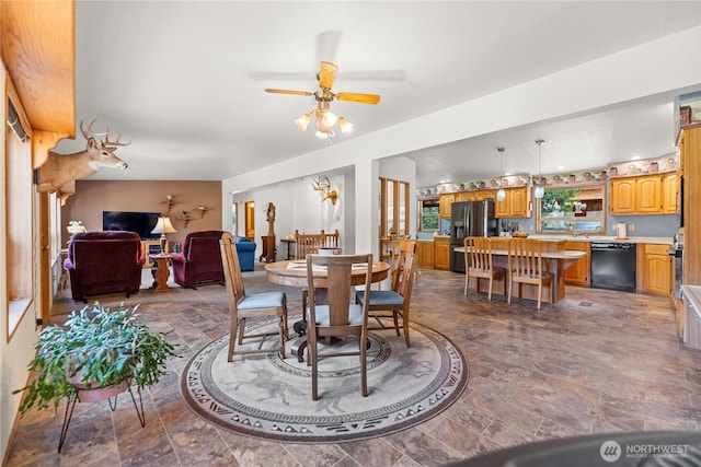 dining area with ceiling fan