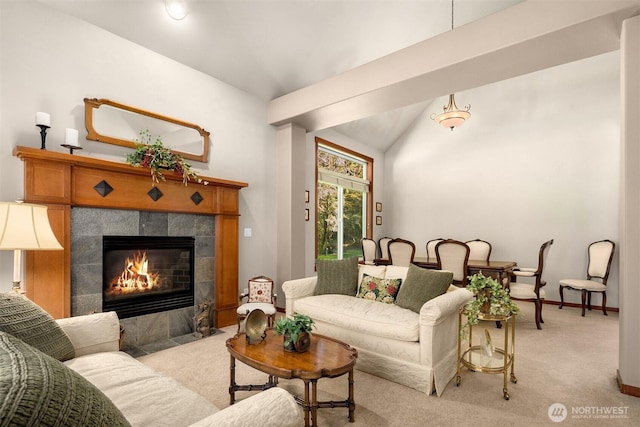 27909 SE 268th St, Ravensdale, WA 98051 - living area featuring baseboards, lofted ceiling, a tiled fireplace, and light colored carpet