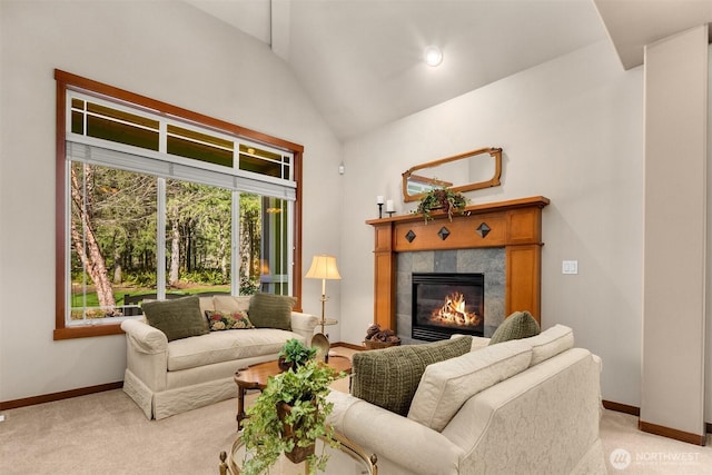 27909 SE 268th St, Ravensdale, WA 98051 - living room with light colored carpet, high vaulted ceiling, baseboards, and a fireplace