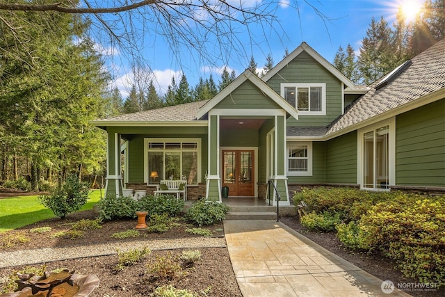 27909 SE 268th St, Ravensdale, WA 98051 - craftsman inspired home with a porch, french doors, and roof with shingles