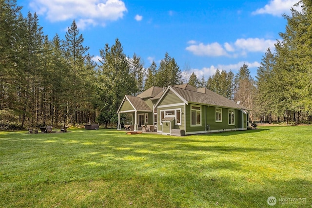 27909 SE 268th St, Ravensdale, WA 98051 - back of house with a lawn and a patio