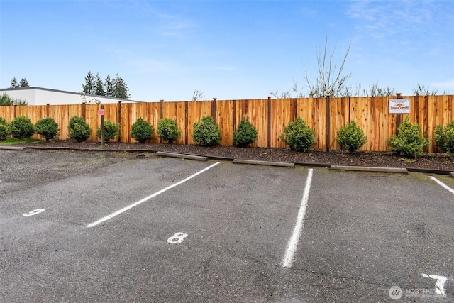 1700 Lake Park Dr SW Unit 8, Tumwater, WA 98512 - uncovered parking lot with fence