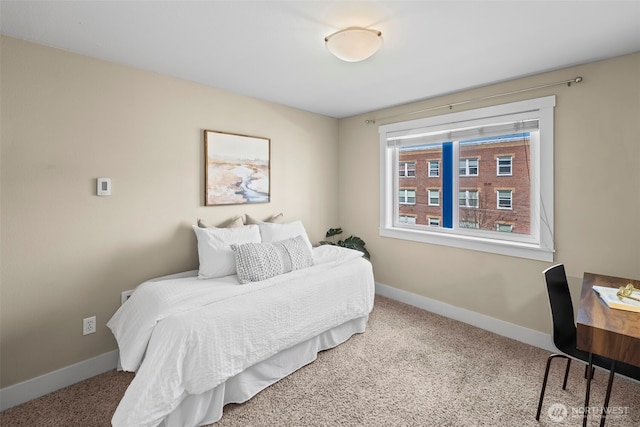 carpeted bedroom with baseboards