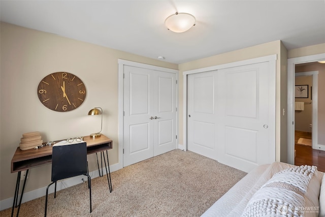 office featuring baseboards and carpet flooring