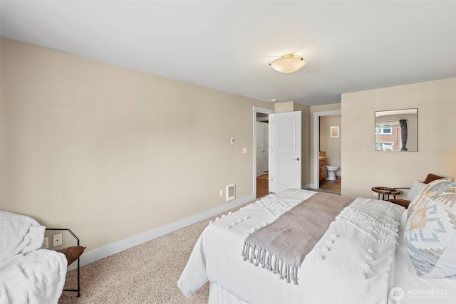 bedroom with baseboards, carpet flooring, connected bathroom, and visible vents