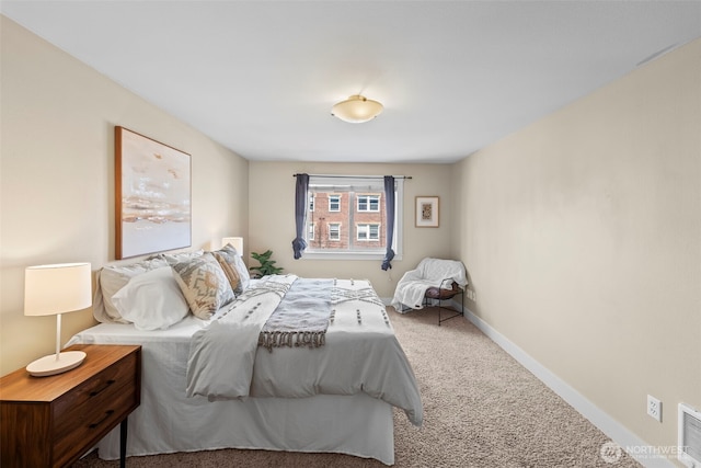bedroom featuring baseboards, visible vents, and carpet flooring