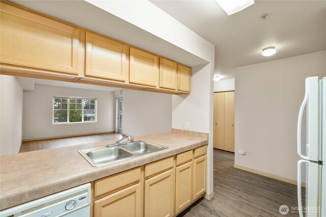 10240 Bridgeport Way SW, Lakewood, WA 98499 - kitchen with light countertops, white appliances, a sink, light wood-style flooring, and light brown cabinets