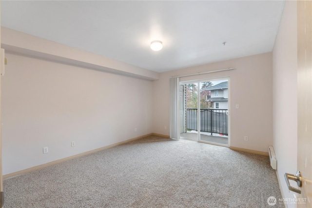 10240 Bridgeport Way SW, Lakewood, WA 98499 - unfurnished room with baseboards, carpet, and baseboard heating