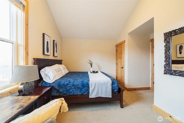 540 Porcupine Ln, Chelan, WA 98816 - bedroom with lofted ceiling, baseboards, and carpet floors