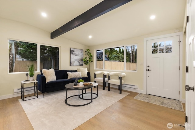 living room with baseboards, lofted ceiling with beams, wood finished floors, and recessed lighting