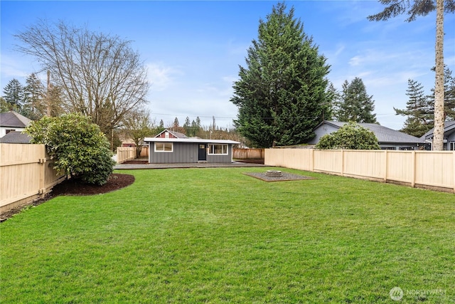 view of yard with a fenced backyard and a wooden deck