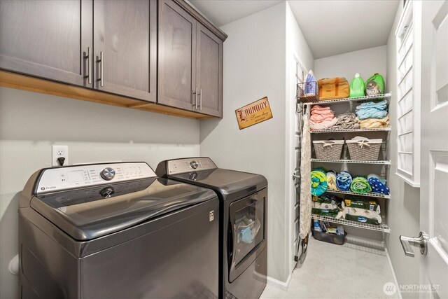 932 121st Ave SE, Lake Stevens, WA 98258 - clothes washing area with baseboards, independent washer and dryer, and cabinet space