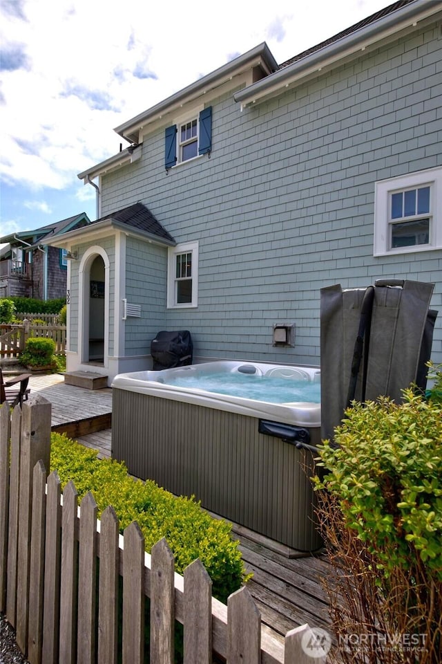 32 Madison Ln, Pacific Beach, WA 98571 - view of patio with a hot tub, a deck, and a grill