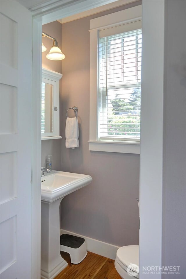 32 Madison Ln, Pacific Beach, WA 98571 - bathroom featuring a sink and wood finished floors
