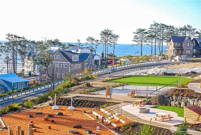 32 Madison Ln, Pacific Beach, WA 98571 - view of home's community with a water view and an outdoor fire pit