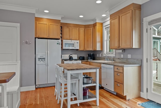 32 Madison Ln, Pacific Beach, WA 98571 - kitchen featuring white appliances, butcher block counters, light wood-style flooring, recessed lighting, and crown molding