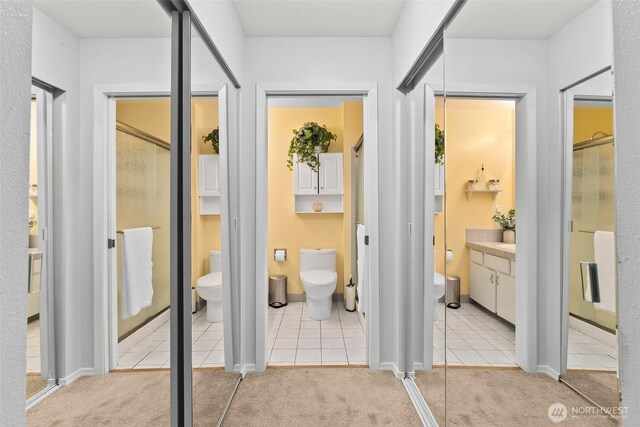 12427 129th Ave E, Puyallup, WA 98374 - hall featuring light carpet and light tile patterned floors