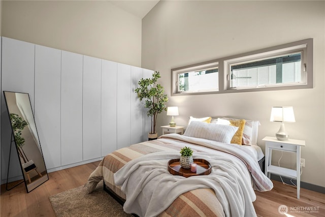 2324 NE 128th St, Seattle, WA 98125 - bedroom with high vaulted ceiling and light wood finished floors