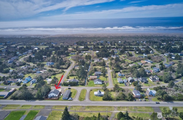 aerial view with a residential view and a water view