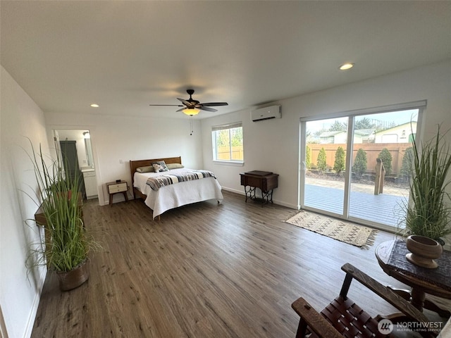 bedroom with recessed lighting, dark wood-style flooring, baseboards, access to exterior, and a wall mounted air conditioner