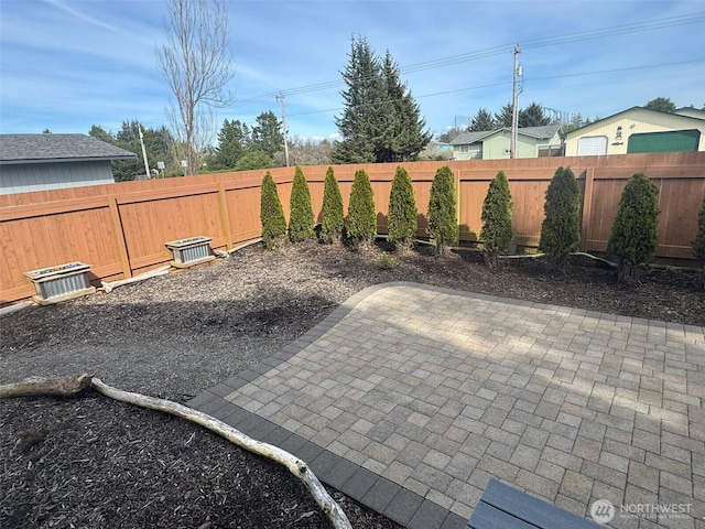 view of patio featuring a fenced backyard