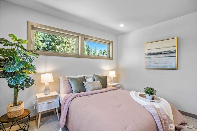 bedroom featuring multiple windows, carpet, and recessed lighting