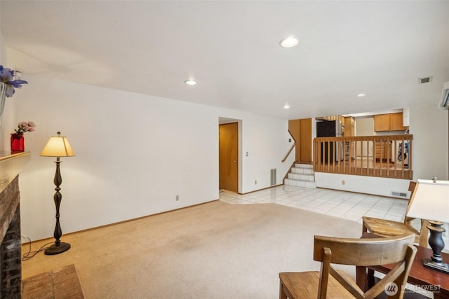 5036 NE 21st St, Renton, WA 98059 - living room with recessed lighting, stairway, visible vents, and light colored carpet