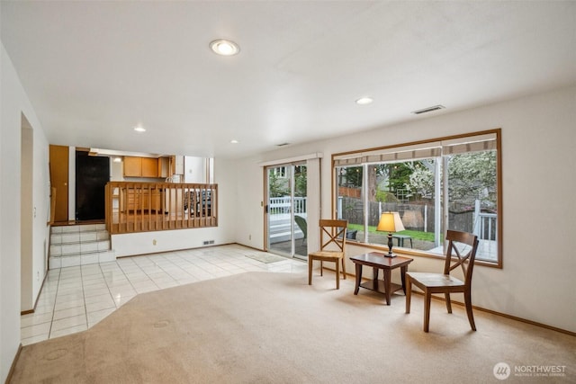 5036 NE 21st St, Renton, WA 98059 - dining area with light tile patterned floors, visible vents, recessed lighting, light carpet, and baseboards