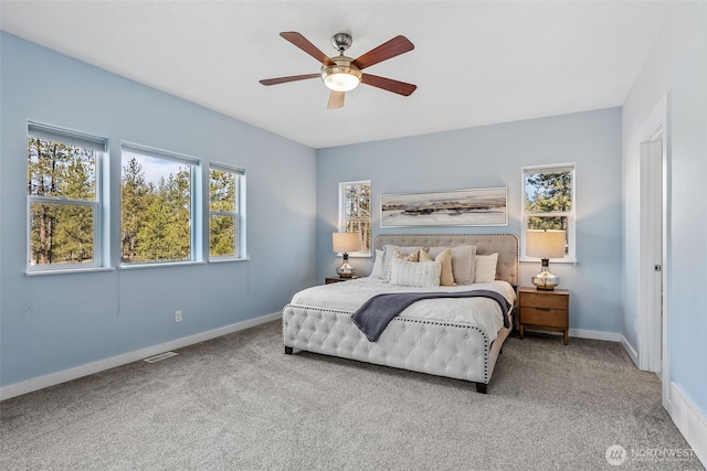 11320 S Stangland Rd, Medical Lake, WA 99022 - carpeted bedroom featuring baseboards, ceiling fan, and visible vents