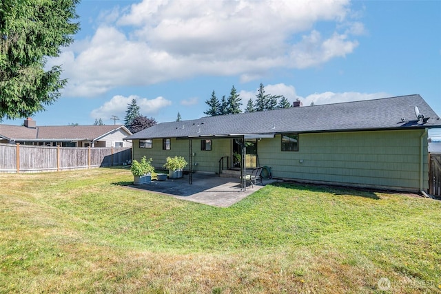 2302 126th Avenue Ct E, Edgewood, WA 98372 - rear view of house with a patio, a fenced backyard, and roof with shingles