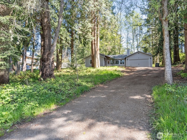 view of front of house with a garage and driveway