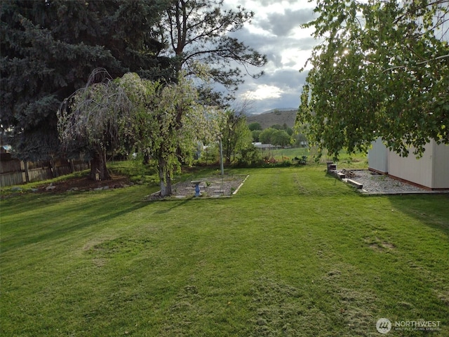 view of yard featuring fence