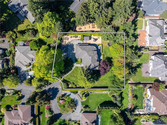 aerial perspective of suburban area with property boundaries highlighted