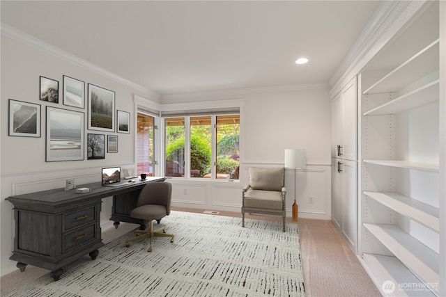 carpeted office space featuring a decorative wall, crown molding, a wainscoted wall, and recessed lighting