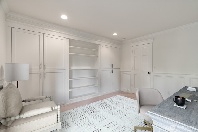 office space featuring light colored carpet, wainscoting, crown molding, recessed lighting, and a decorative wall
