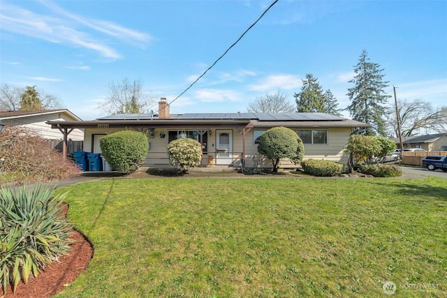 22942 105th Ave SE, Kent, WA 98030 - single story home featuring a garage, a front yard, solar panels, and a chimney