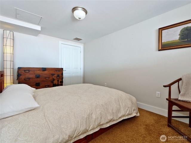 1500 4th Ave Unit 905, Seattle, WA 98101 - bedroom with baseboards, visible vents, and carpet floors
