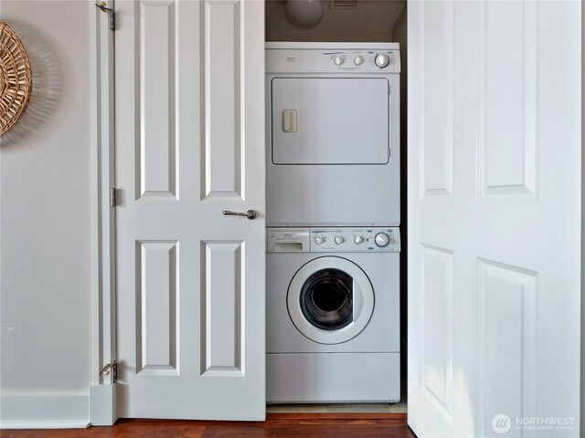 1500 4th Ave Unit 905, Seattle, WA 98101 - clothes washing area with laundry area and stacked washer / dryer