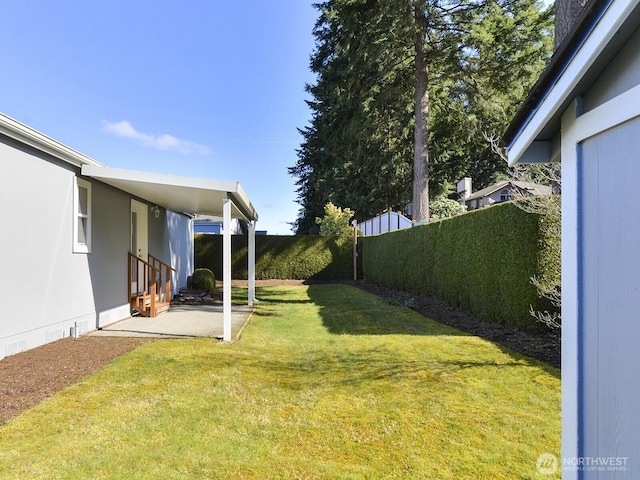 6012 91st Street Ct E, Puyallup, WA 98371 - view of yard featuring a patio, a fenced backyard, and entry steps