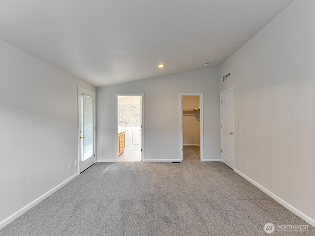 6012 91st Street Ct E, Puyallup, WA 98371 - carpeted empty room with baseboards, visible vents, lofted ceiling, and recessed lighting