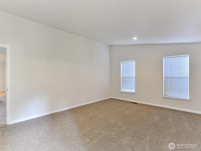 6012 91st Street Ct E, Puyallup, WA 98371 - spare room with carpet, baseboards, and visible vents