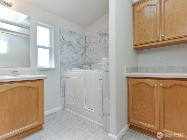 6012 91st Street Ct E, Puyallup, WA 98371 - full bath with vanity and baseboards