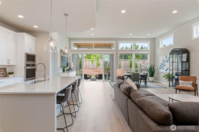 6346 Marymere Rd SW, Port Orchard, WA 98367 - living area with recessed lighting and light wood-style floors