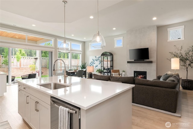 6346 Marymere Rd SW, Port Orchard, WA 98367 - kitchen with dishwasher, light wood-style floors, recessed lighting, white cabinets, and light countertops
