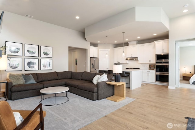 6346 Marymere Rd SW, Port Orchard, WA 98367 - living area featuring light wood-style flooring and recessed lighting